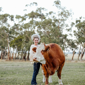 Bachelor of Business (Marketing) graduate Ruby Canning working on her cattle stud