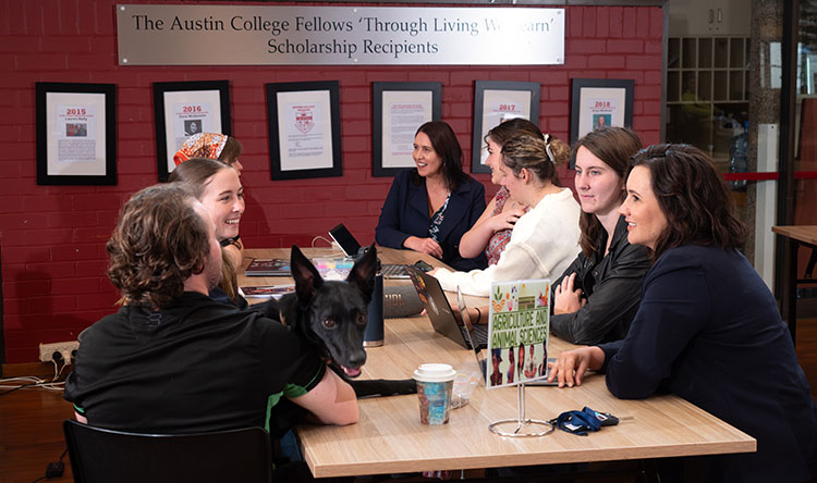 Jane Schmude and Tash Hawkins with students