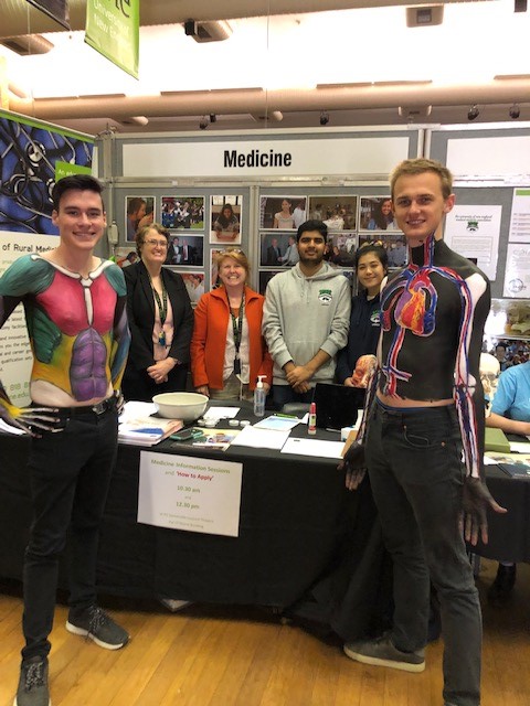Medical students and staff in Lazenby Hall at UNE Open Day. 