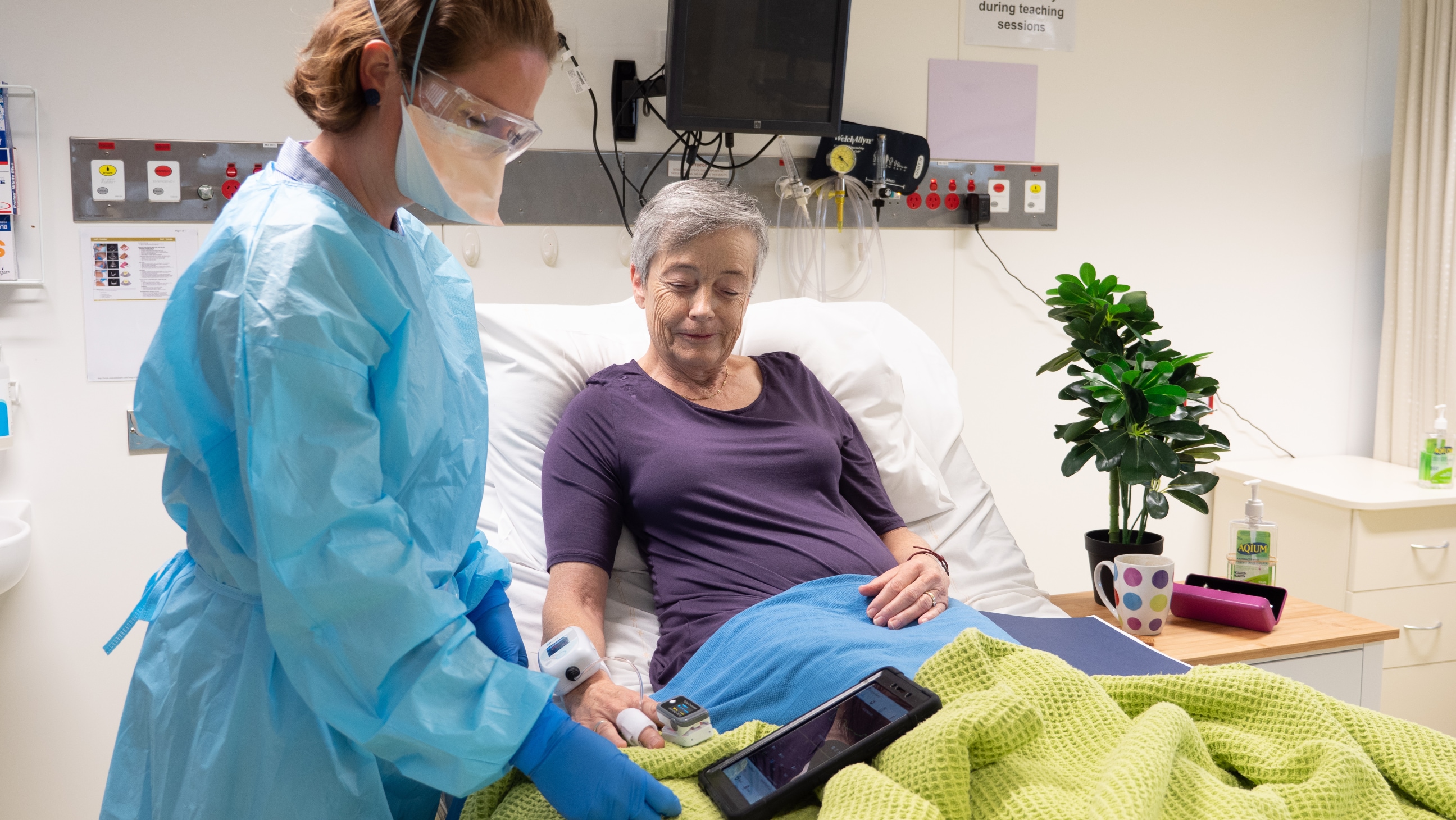 Dr Susan Paul, Clinical Dean, Tablelands Clinical School, plays the patient during testing of the new remote monitoring equipment.