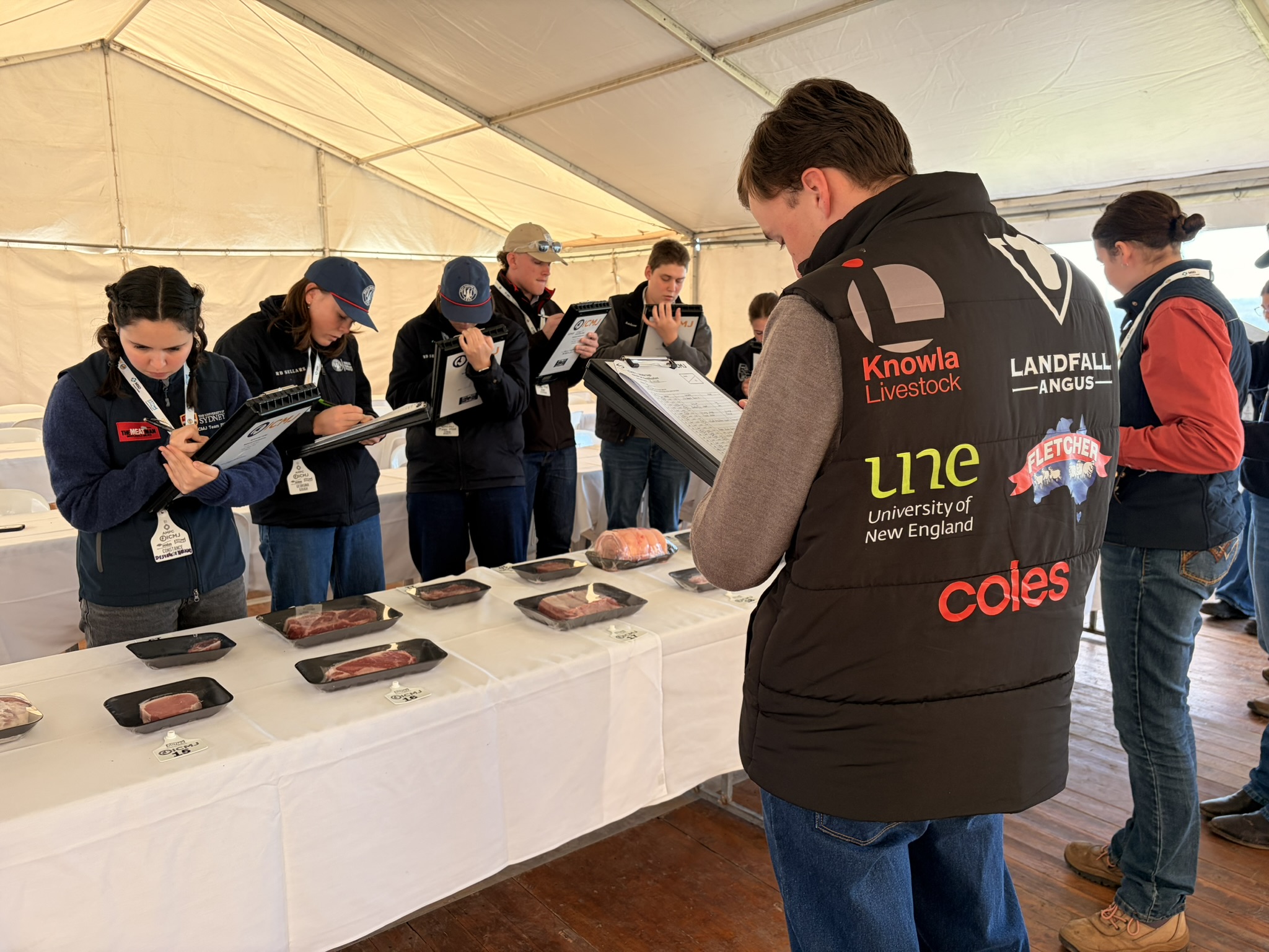 Students judging meat at ICMJ