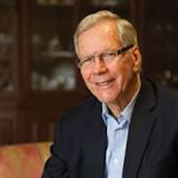 Close up of Former South Australian Premier Dean Brown in blue shirt, black jacket