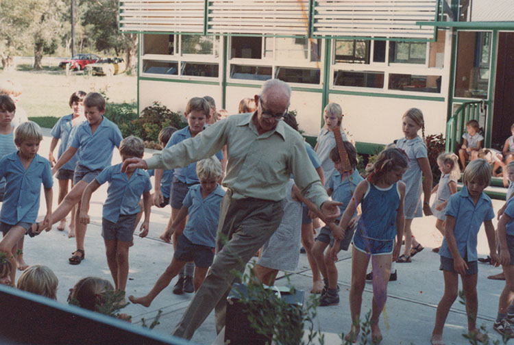 Geoffrey Walker dancing with students