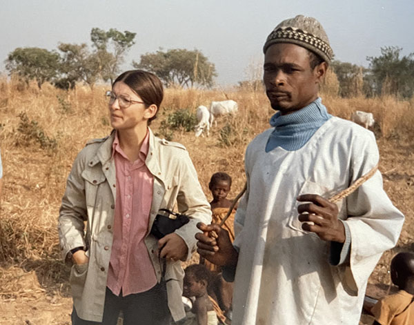 Ann and Fulani leader Dawobe Abayin observing cattle in Madauchi, Nigeria. Photo Ellen Taylor-Powell. 