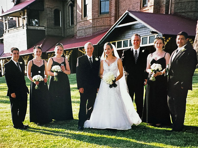Clare and Dan in front of Booloominbah on their wedding day in November 2009.