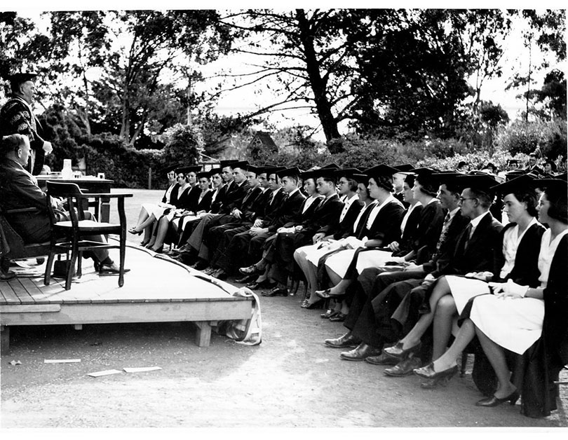 Black and white photo from 1939 of a matricualtion ceremony outside Booloominbah 