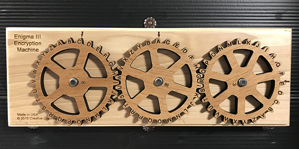 Wooden device of three interlocking wheels for coding