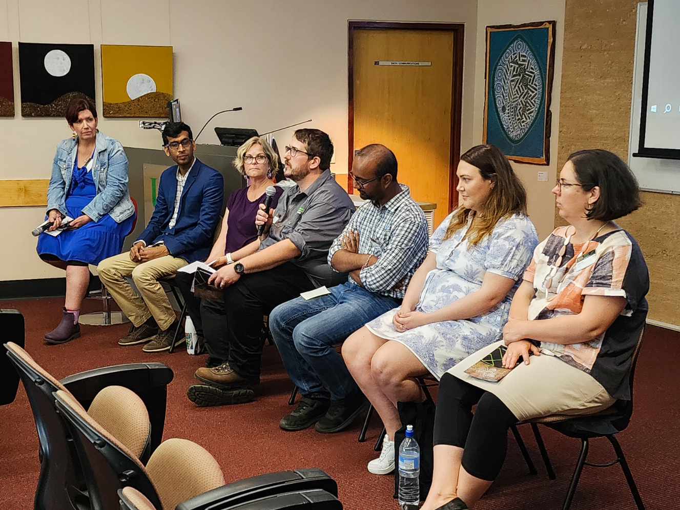 Postgraduate students at research conference