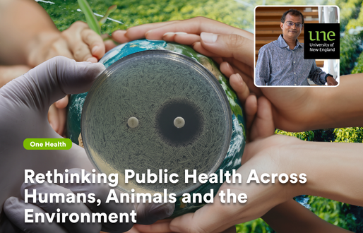 Multiple hands from different people gently hold a small globe with a petri dish of bacteria superimposed on it, symbolising antimicrobial resistance, with a small inset photo of a UNE academic in the top-right corner. Overlaid text reads “Rethinking Public Health Across Humans, Animals and the Environment” with a green One Health label.