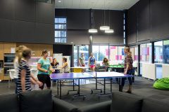Students playing table tennis in Wright College common room