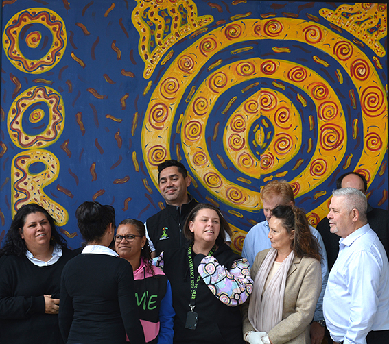 2017 Oorala staff in front of mural installation