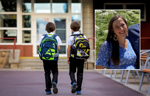 Two primary school children wearing backpacks walk side by side towards a school building, with an inset photo in the top right corner showing Erin Linn smiling outdoors, wearing a blue patterned dress.