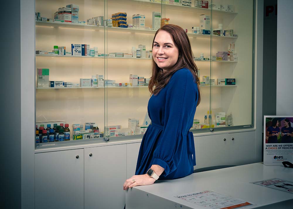 Anna Barwick standing in front of a medicine cabinet