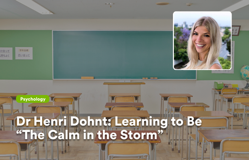 A bright, empty classroom with rows of wooden desks facing a large green chalkboard, softly lit by natural light. In the top-right corner, an inset portrait shows Dr Henri Dohnt smiling against a blurred outdoor backdrop. Overlaid text reads: “Dr Henri Dohnt: Learning to Be ‘The Calm in the Storm’,” with a small green label indicating “Psychology.”