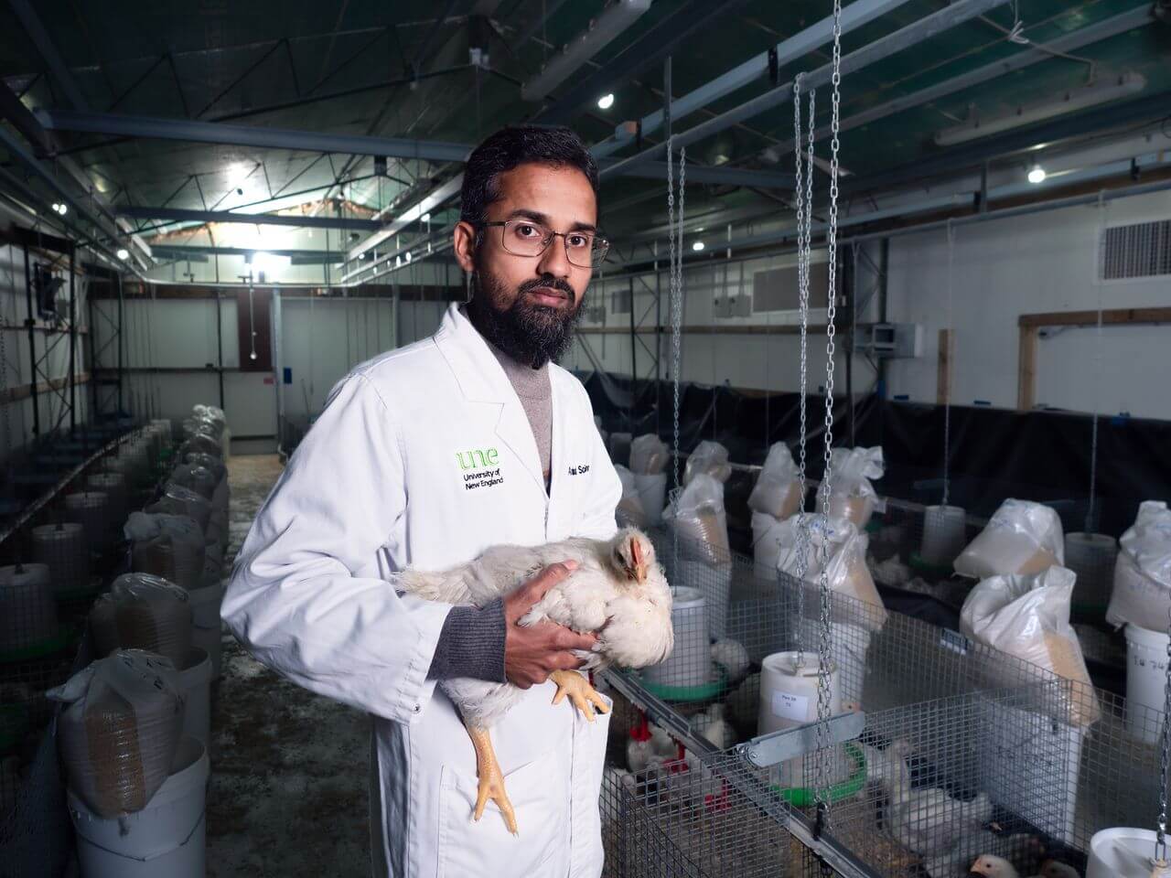 Man holding a chicken