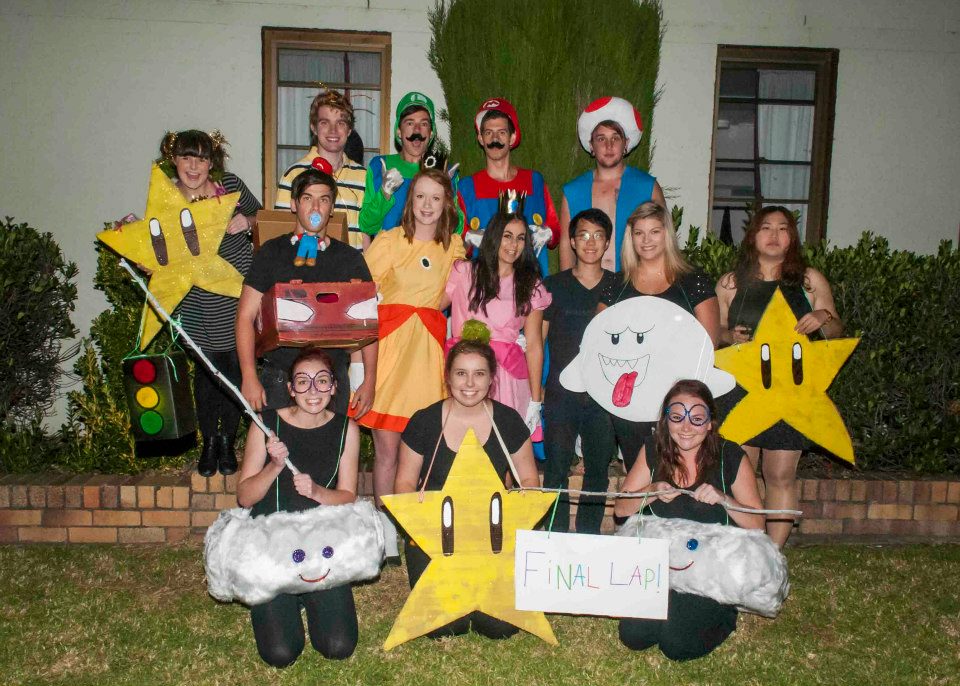 Group of students dressed up as Mario Brothers characters for Arts Dinner
