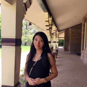 UNE student poses at Booloominbah