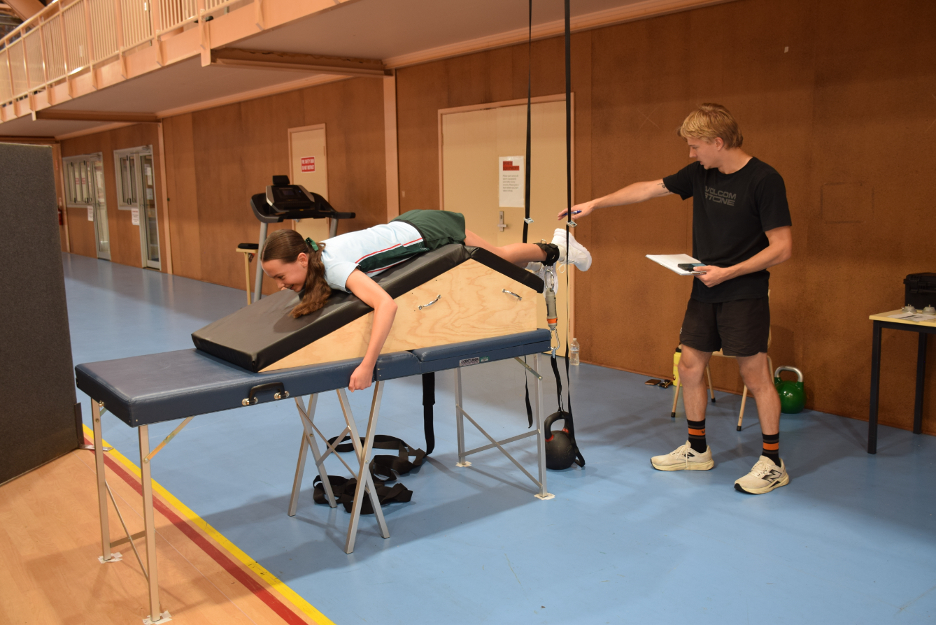 Oskar carrying out resistance interventions on a PLC student
