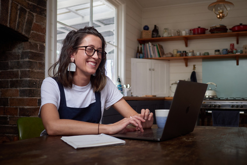 Woman studying online at home