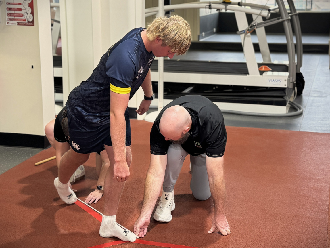 Luke Whitty conducting one of the sports science assessments