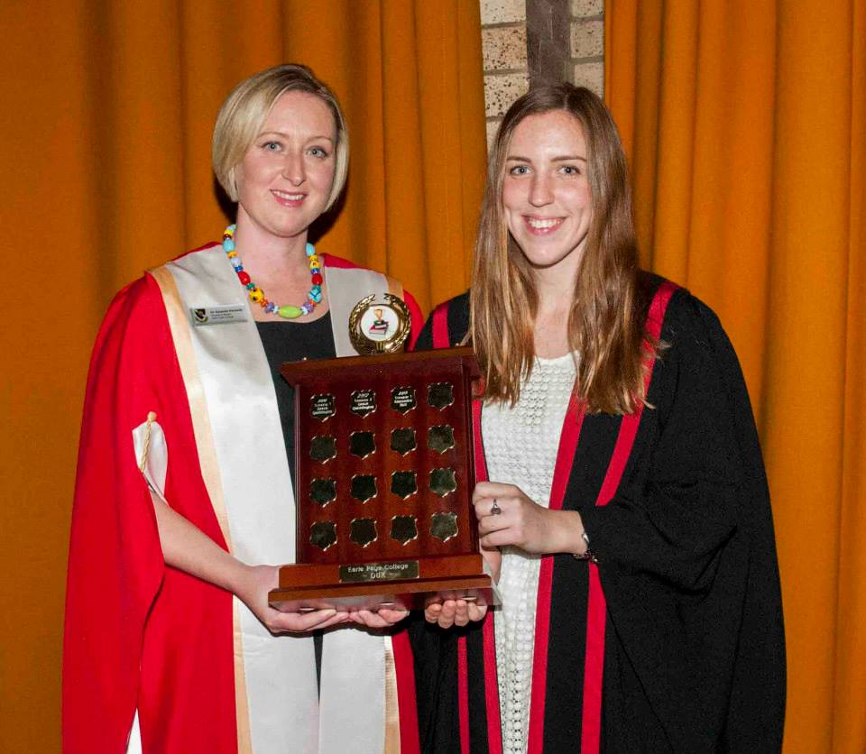 College dux receiving an award from the Academic Master.