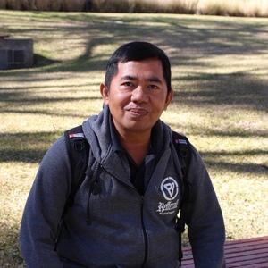 UNE student on Armidale campus