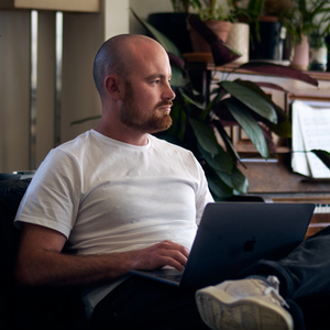 UNE Bachelor of Arts (Philosophy) student Harrison Munday studies on his laptop at home