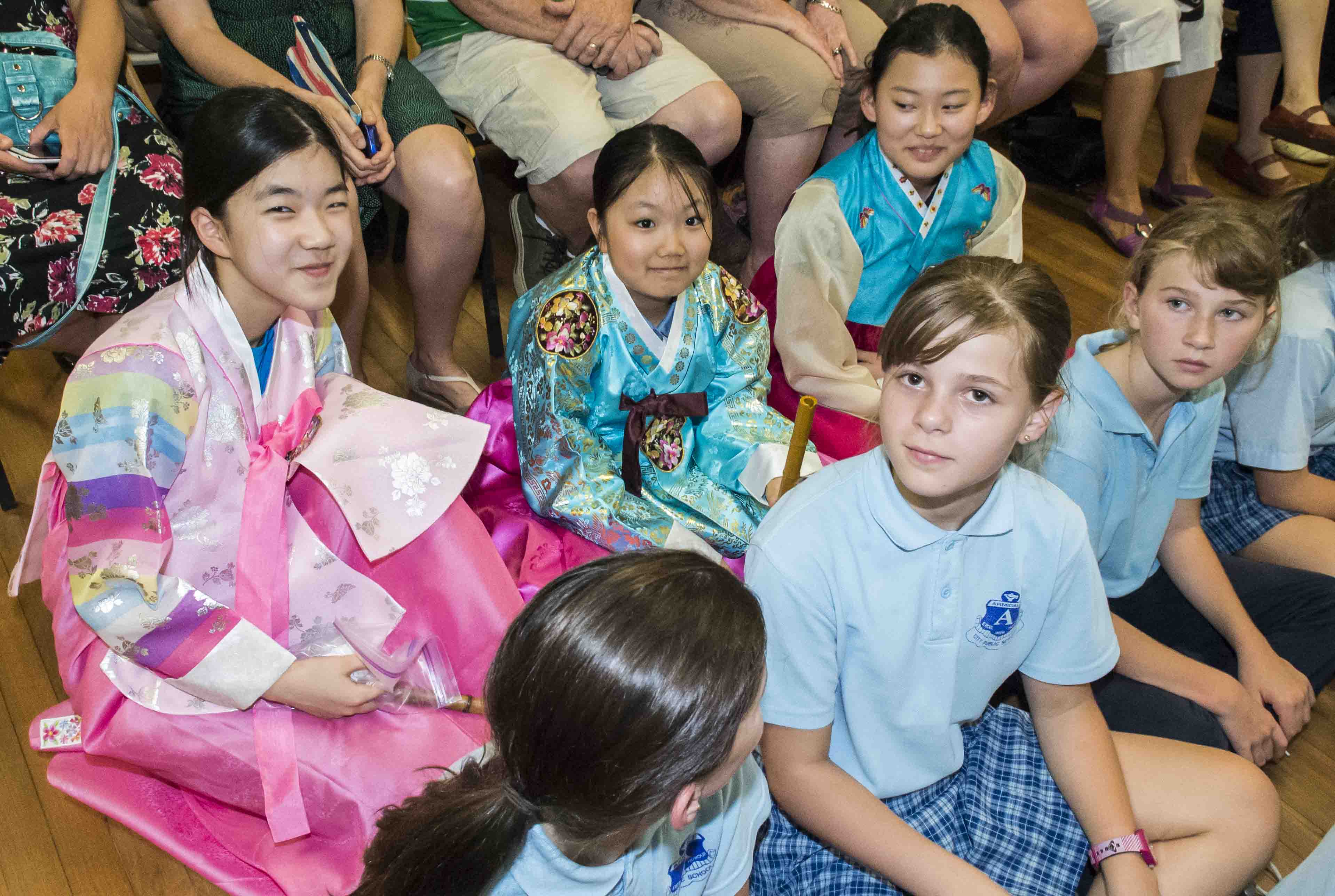 Students at assembly with their overseas visitors.