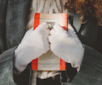 hands holding a book