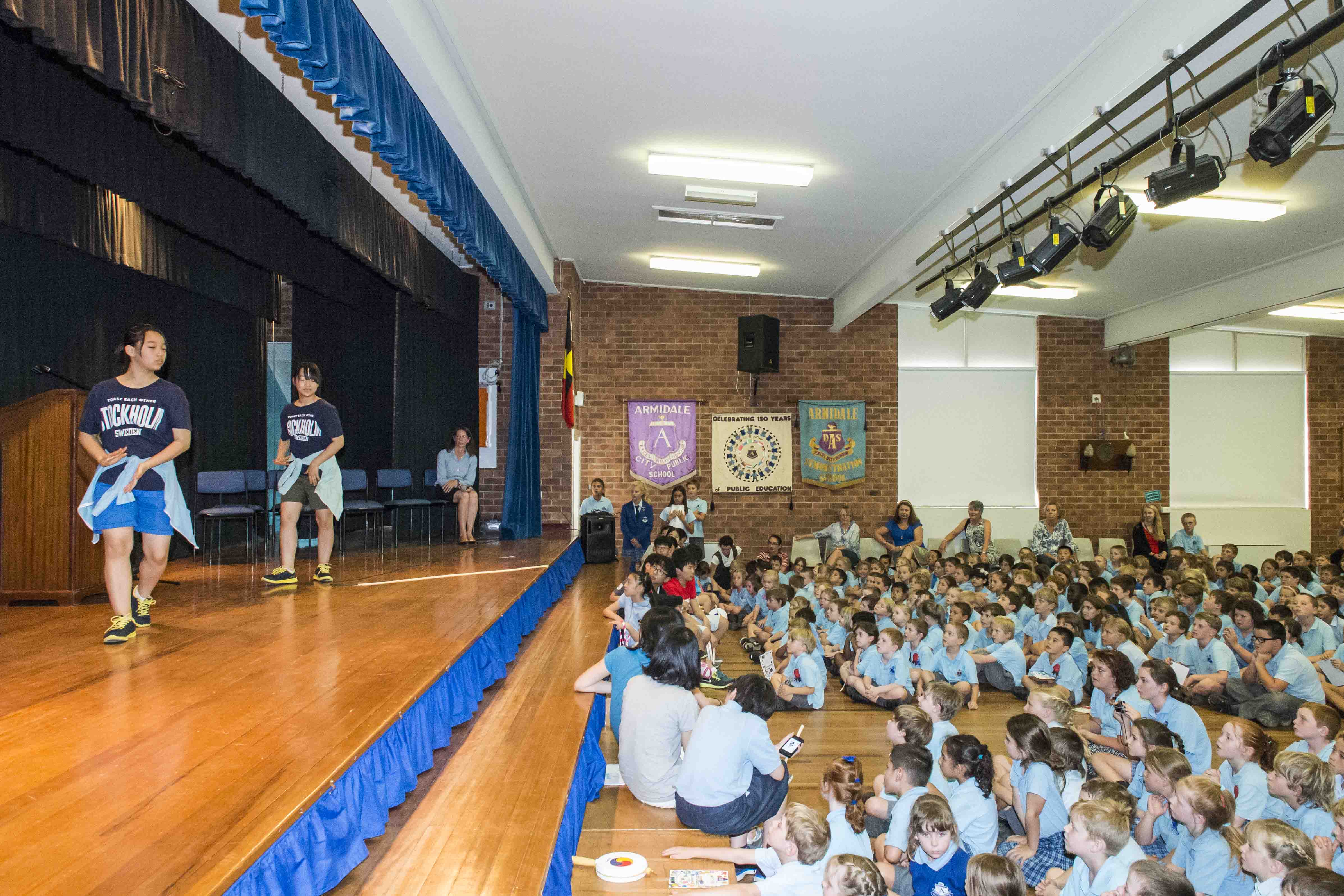 Students at assembly with their overseas visitors.