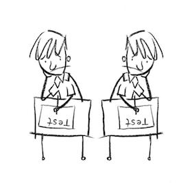 Twins Study Twins at a desk