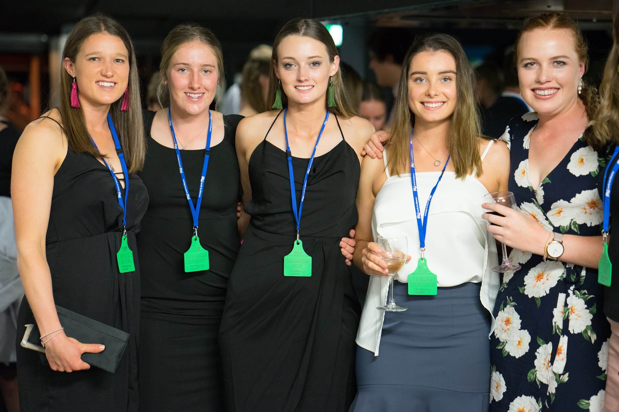 Group shot of five female students at dinner