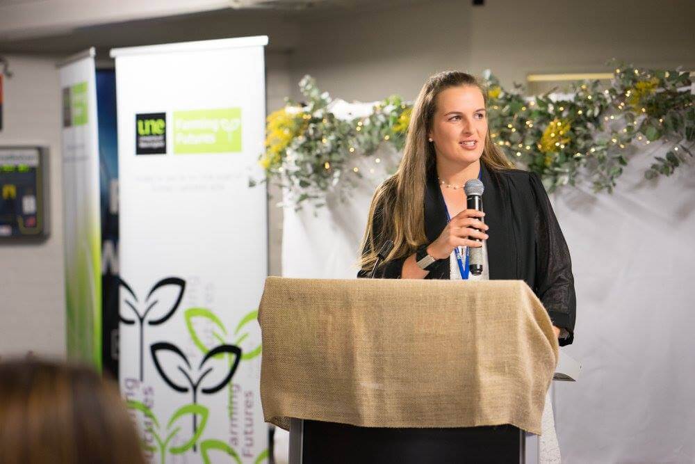 Farming Futures president standing at podium delivering the welcome