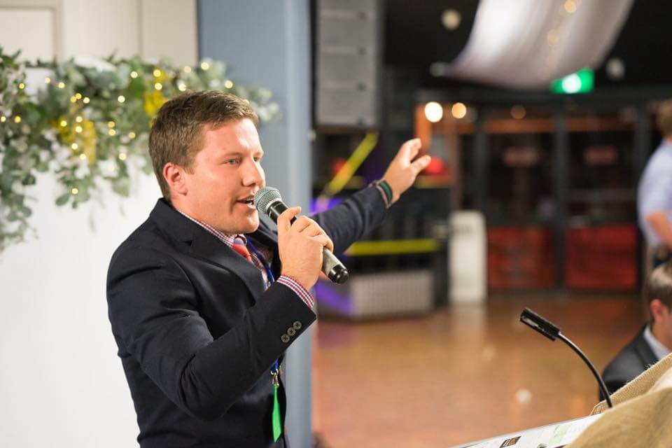 Auctioneer in action at charity auction 
