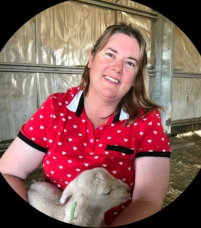 Woman holding a lamb
