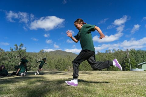 Child running as part of the UNE Discovery Sports and Exercise science learning activity.