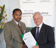 Hon Philip Ruddock presenting Subba Reddy Yarram with award