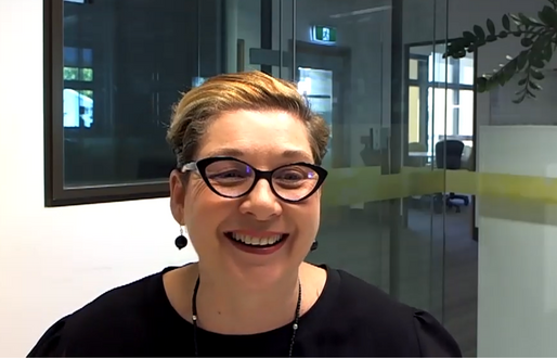Portrait of middle aged woman with glasses smiling