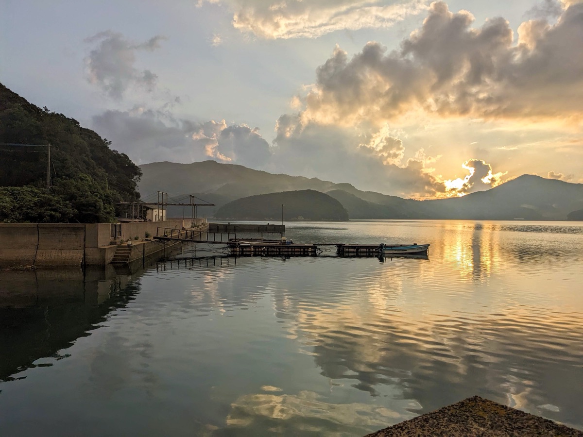 Sunrise over a waterfront on Hisaka Island