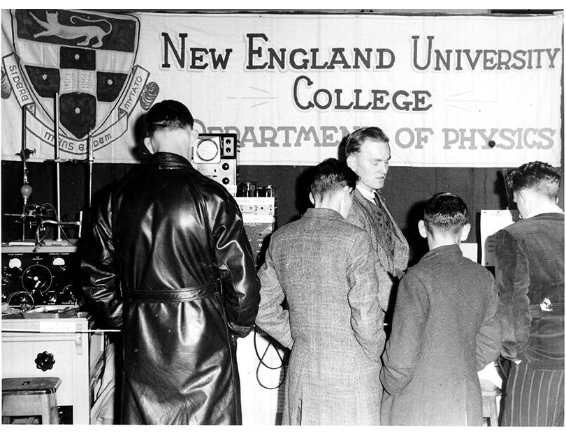 Black and white photo of NEUC display by the Dept. of Physics 