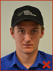 Example of unacceptable ID photo as subject is wearing hat