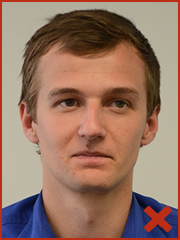 Example of unacceptable ID photo as subject not looking at camera