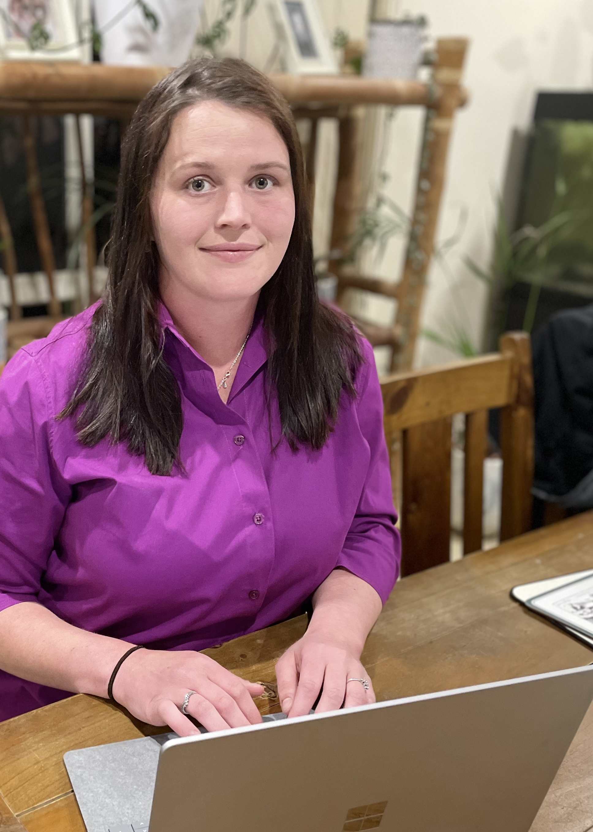 Nicole at home at her workstation
