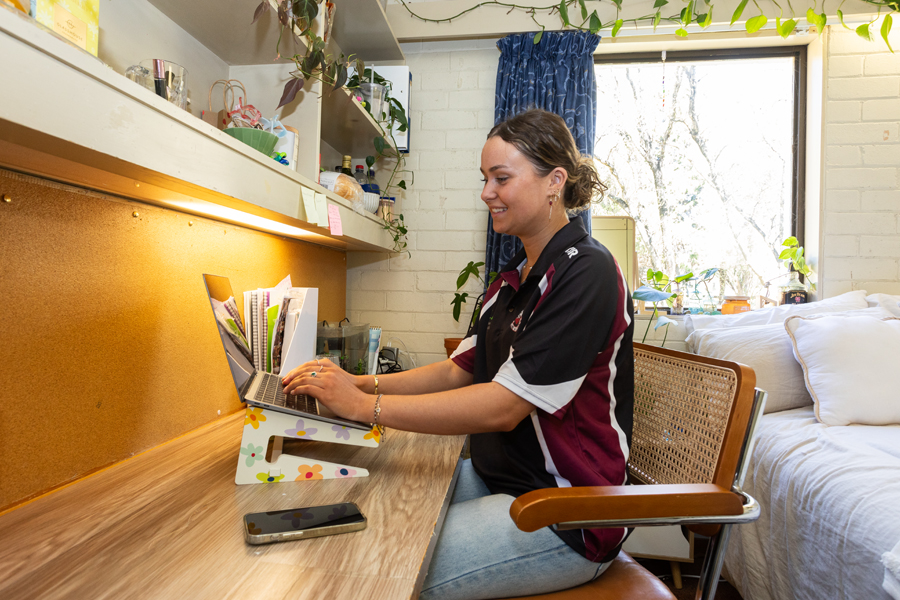 Student Studying in their Bedroom at Austin Page College 