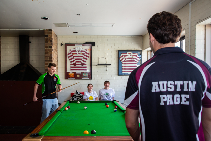 Students playing pool at Austin Page College 